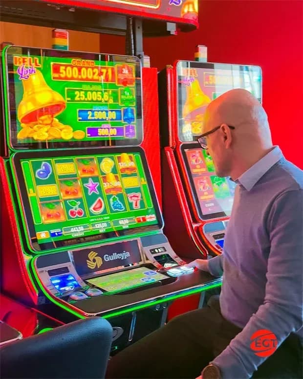Multi-level progressive jackpot system with four distinct prize tiers