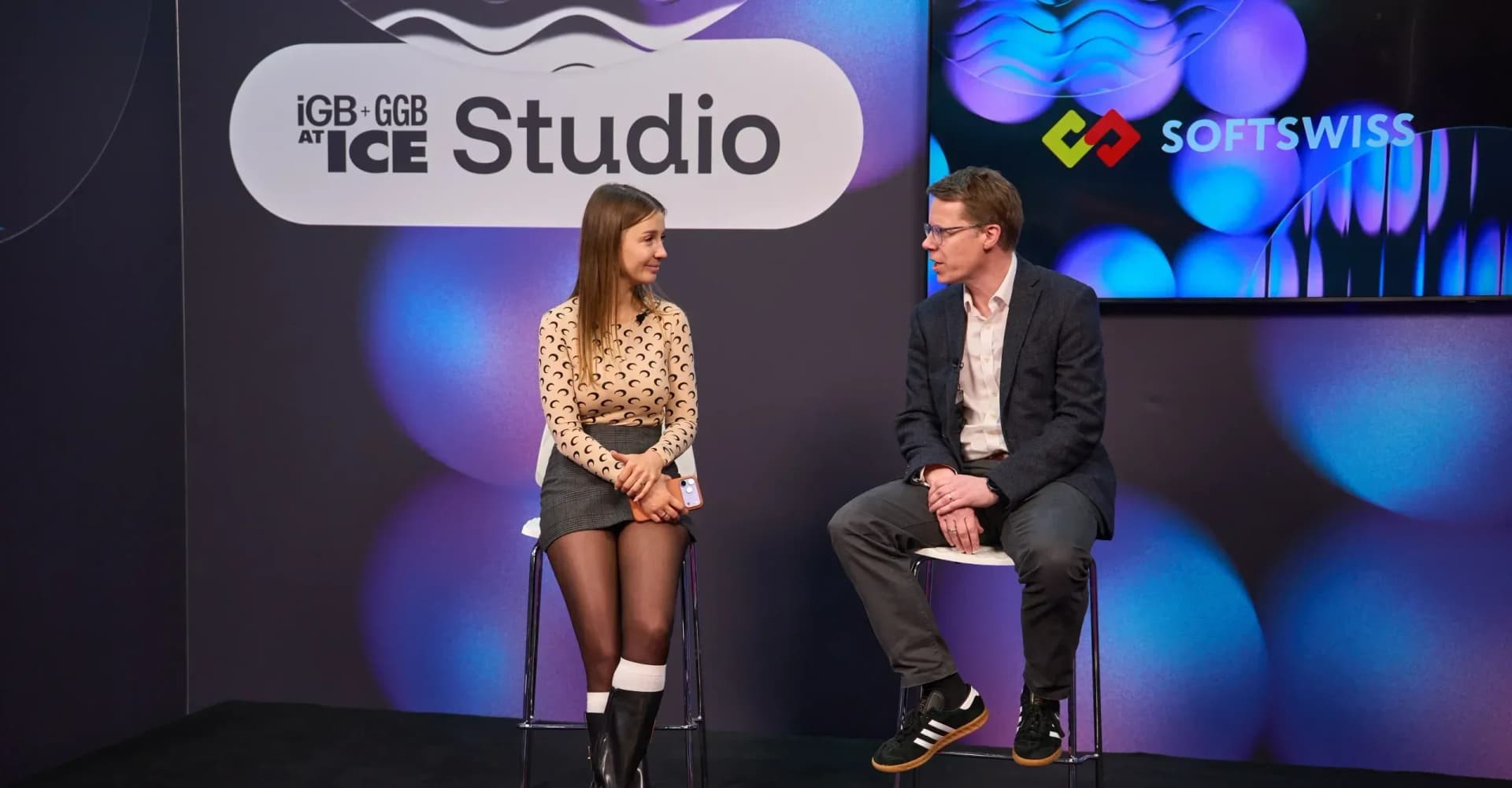 Senior professionals engage in conversations about SOFTSWISS scalable and compliant iGaming solutions