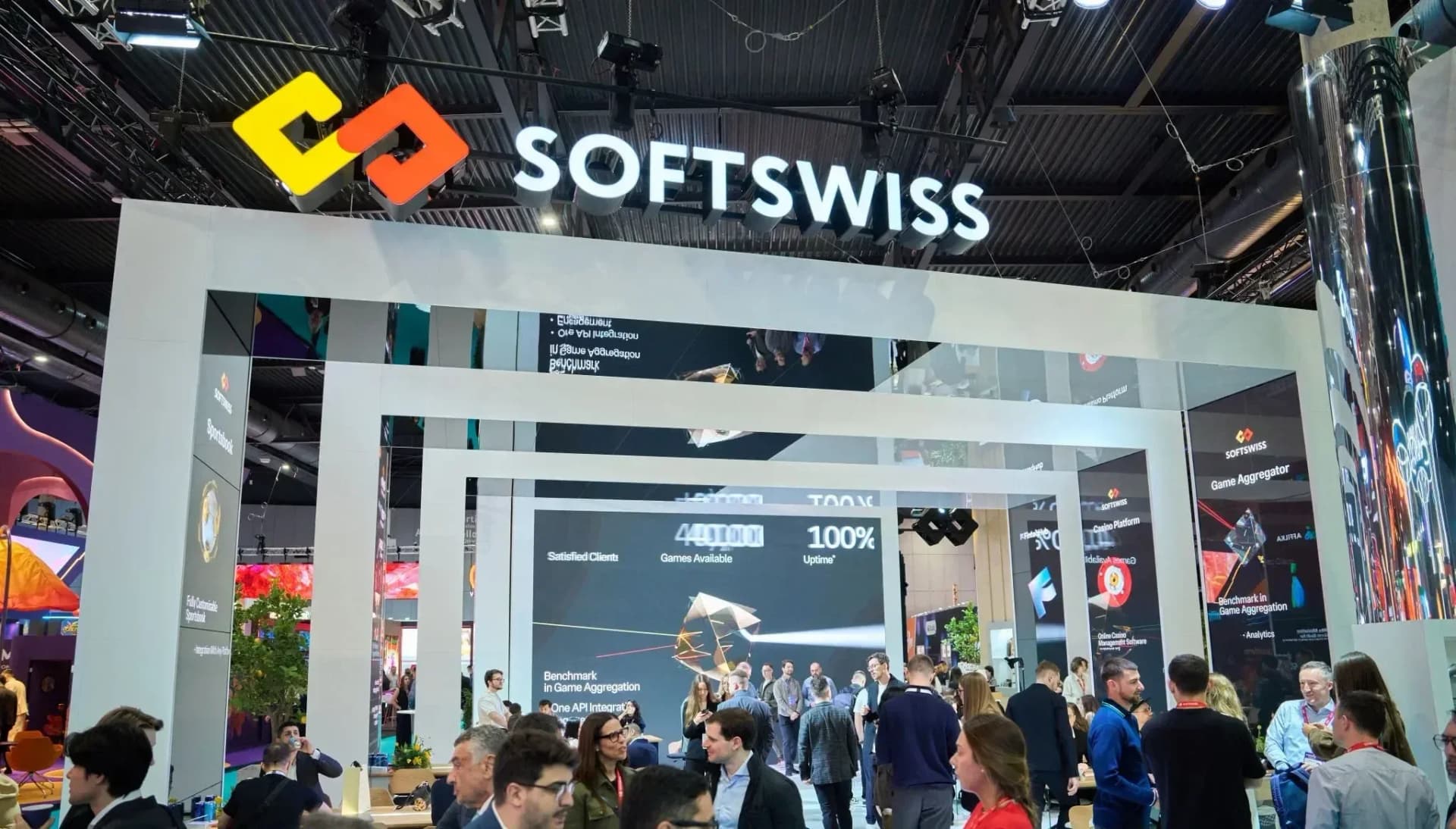 Visitors explore SOFTSWISS platform offerings at 270 square meter stand